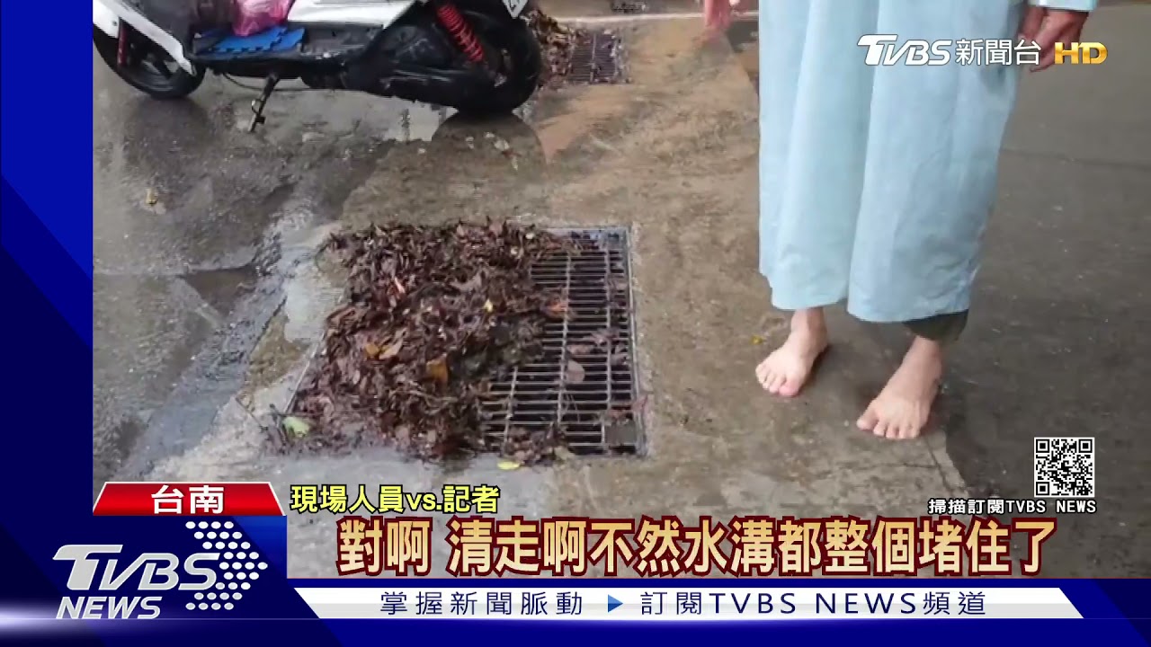 台南大雨路面積水 買菜婆媽遇雨襲困市場