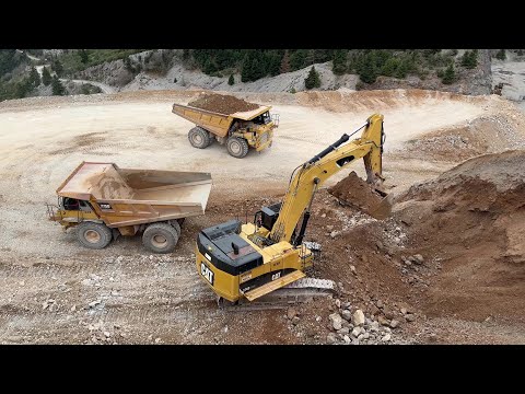 Caterpillar 374D Excavator Loading Caterpillar 775D Dumpers - Interkat SA - 4K