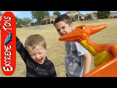 Pterodactyl Attack! Boys get attacked by Toy Dinosaur at the park Video