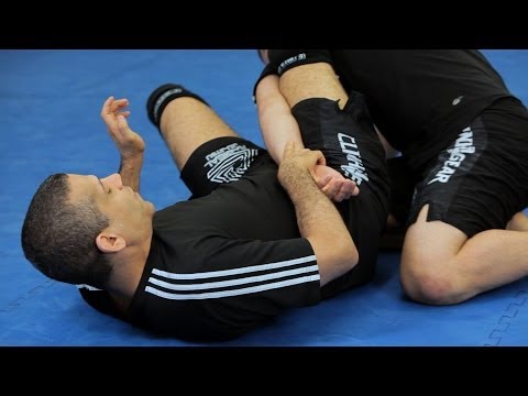 How to Do an Omoplata | MMA Submissions