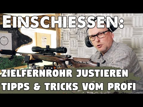 Zeroing hunting rifles at the shooting range: Checking the point of impact and adjusting the rifl...