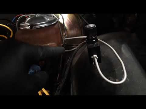 Adjustable proportioning valve for rear brakes