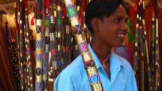 Shopping of decorated bamboo sticks, Pushkar