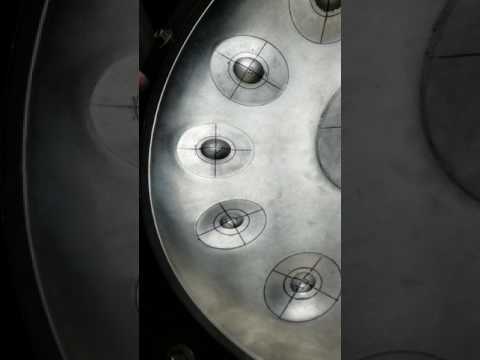 Fine shaping a handpan note.