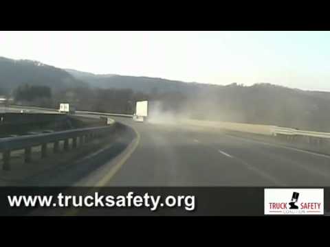 Overweight truck burns up his brakes coming down mountain