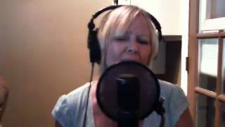 Woman at home singing,"When a man loves a woman"