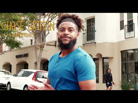 UCLA Quarterback Chase Griffin works with Scotch Porter