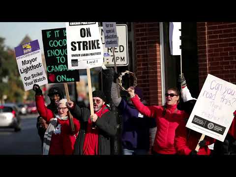 Chicago teachers threaten strike as tensions rise over reopening schools