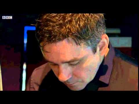 Alan McManus enters the Crucible to defeat former Champion John Higgins.