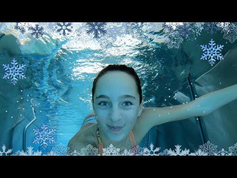 Carla Underwater swimming in a winter resort