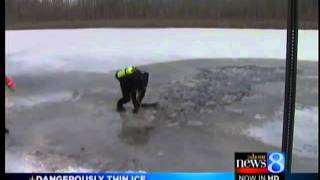 preview picture of video 'Abandoned snowmobile found on icy lake'