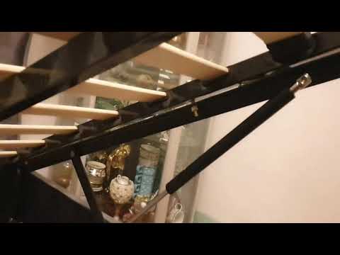 Part of a video titled How to assembly Ottoman Bed - Gasket is stuck - leaver don't go down