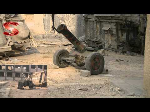 تجهيز قذيفة مدفع محلي الصنع عيار 165 من قبل كتيبة رايات الحق لضرب مقرات النظام في حي الجبيلة في دير الزور