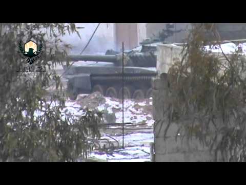 الاشتباكات الدائرة بين كتيبة الناصر صلاح الدين وقوات النظام على أسوار إدار الدفاع الجوي في المليحة في ريف دمشق