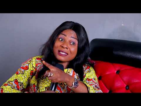 Maman MBUDI (Comédienne et Musicienne) et l'abbé Jean-Marie K. dans la Noblesse Oblige