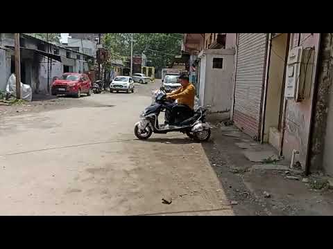 Three wheeler battery operated scooter