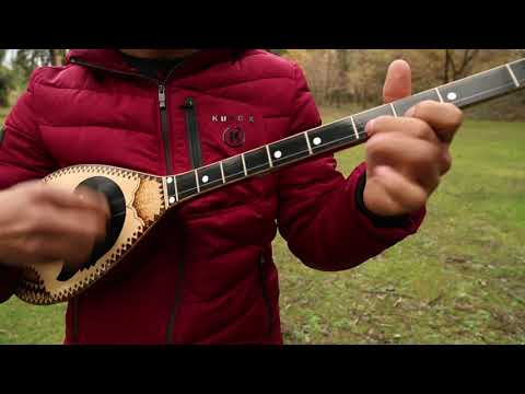 Vallja e Tropojës me Çifteli. (Playing Cifteli)