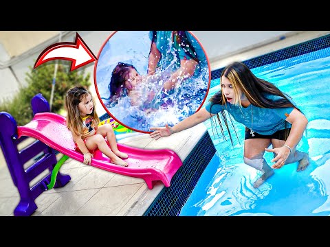 MINHA IRMÃ ESCORREGOU NO ESCORREGADOR NA PISCINA PELA PRIMEIRA VEZ!!