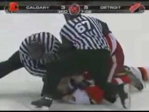 Huge Hit By Dion Phaneuf on Hudler