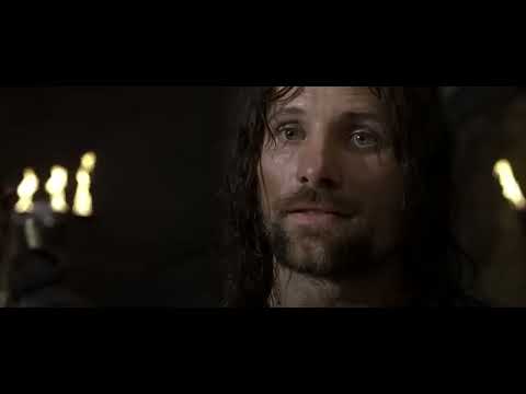 Official Two Towers trailer frame — Rohirrim riders, siege walls, and the album’s hardanger-fiddle-and-choir palette