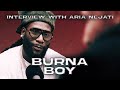 Burna Boy Talks Confidence Jewelry Own Festival Tiny Desk Interview With Aria Nejati