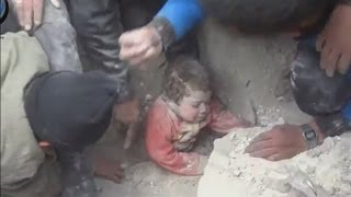 Amazing rescue: Buried baby is pulled from underneath rubble in Aleppo, Syria