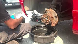 How to Replace Front Brake Rotors, Pads & Calipers on a 1995 Ford Probe