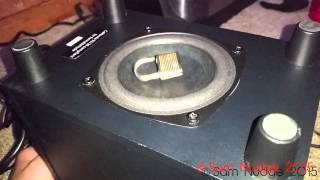 Putting items on a moving subwoofer... | From Sheer Boredom