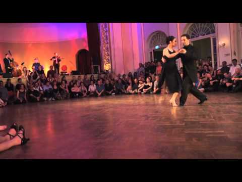  Joachim Dietiker  and  Michelle Marsidi  are  dancing  to  "  Chique  "  by  Solo Tango Orquesta  at  TangoFest Dresden  in  2016