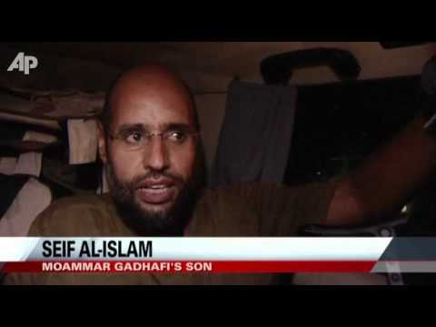 Gadhafi's Son Appears, Tripoli Fight Carries On