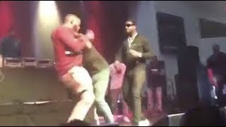 Alleged Goon Attempts To TACKLE Gucci Mane On Stage During Live Performance?!?!