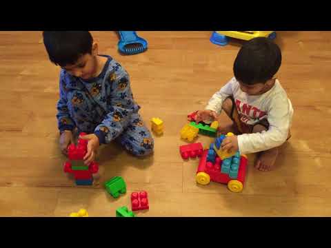 Dilraj and Navraj playing with Megablocks