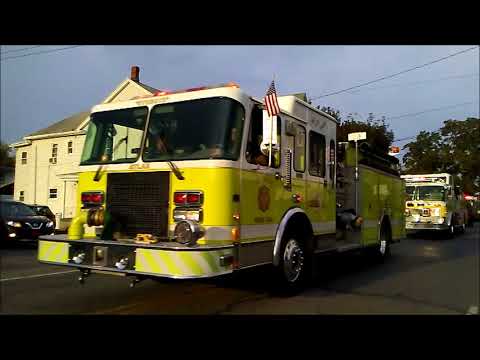 Fire Apparatus sounding their sirens as they go by The Mt. Carmel Silver Bowl Stadium 9 - 15 - 2017