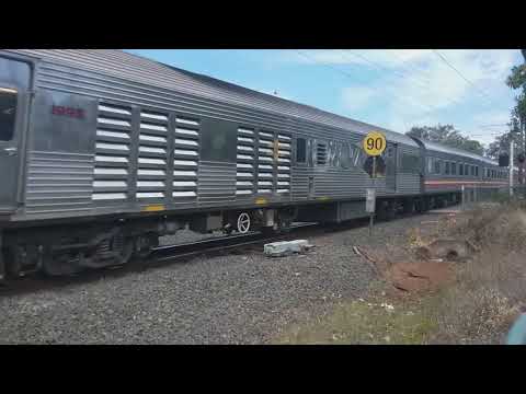 QR 2410 and 1725 lead northbound Spirit of the Outback through Narangba on the points on #PW57