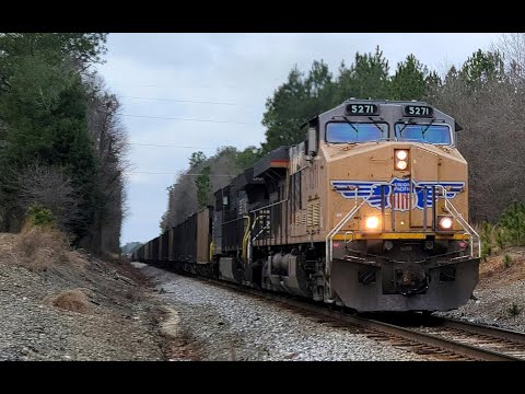 NS I42 heading out of Columbia with UP 5271 leading