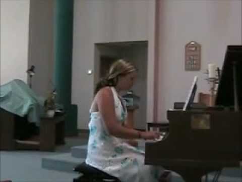Niki Andre plays the piano