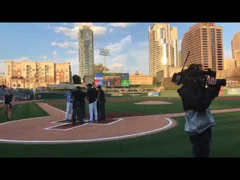 Will Muschamp throws out the first pitch before Tuesday's baseball game in Charlotte