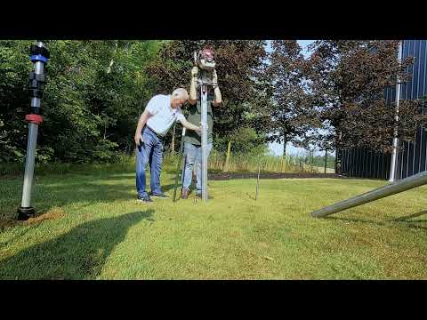 Installing a Post Master Fence Post with a Titan Post Driver