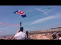 Shocking moment RAF parachutist hits burger van.