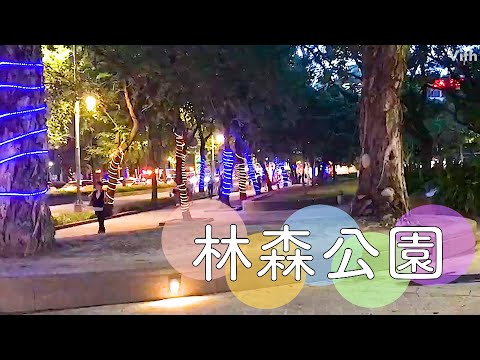 Um parque na cidade de Taipei com um grande portão torii e uma estátua equestre de Yue Fei [Parque Lin Sen]