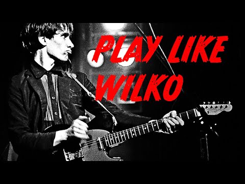 Adrian attempts...to play like Wilko Johnson