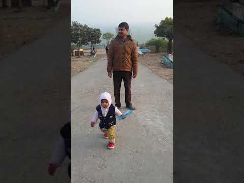 Small child climbing on sheikhpura grindha mountain