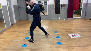 Footwork  Home Demonstation  ( Intermediate footwork drill with punching )