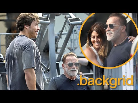 Arnold Schwarzenegger gets birthday hugs at Gold's Gym in Venice Beach