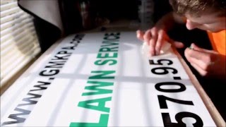 Applying Vinyl stickers to coroplast corrugated plastic business yard sign - it