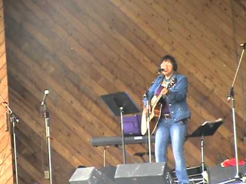 Doris Munger sings Dottie Rambo Sheltered in the arms of God at BVX cowboy church 2011.mpg