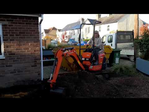 Loading a skip with my mini garden digger - customer video