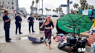 𝗛𝗢𝗠𝗘𝗟𝗘𝗦𝗦 𝗦𝗪𝗘𝗘𝗣: Police Order Unhoused Woman to Collect Belongings During Venice Cleanup Operation