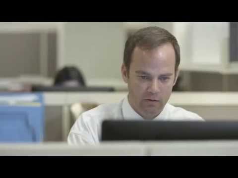 Judy Kain as "The Boss" in AIM 's Commercial