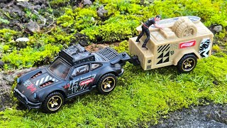 I bought this at the Kruidvat for €3,99 and I love it. Hot Wheels Porsche 911 off-road with trailer.